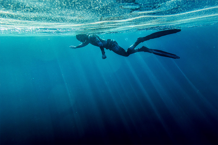 Why Humans Swim